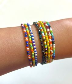 Colorful seed bead bracelets sold in packs 3, of various patterns in colors you choose! Bracelets are stretchy and stackable. Cheap Multicolor Bracelets With Tiny Beads, Multicolor Beaded Wrap Bracelet As Gift, Multicolor Beaded Friendship Wrap Bracelet, Multicolor Heishi Beads Friendship Bracelets, Multicolor Round Beads Wrap Bracelet For Friendship, Multicolor Beaded Wrap Bracelet For Friendship, Multicolor Hand-strung Heishi Beads Friendship Bracelets, Multicolor Tiny Beads Wrap Bracelet For Friendship, Multicolor Beaded Stretch Bracelet For Friendship