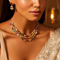 Description :Our three-layer Navaratna necklace is a captivating ode to India's cultural heritage and spiritual significance. With two layers of vibrant Navaratna gemstones, each symbolizing a unique cosmic influence, separated by a layer of glistening CZ stones, this necklace seamlessly blends tradition and contemporary elegance. Beyond a mere jewellery piece, wearing this necklace is a connection to age-old traditions and a vivid symbol of the rich cultural heritage, effortlessly elevating you Navaratna Necklace, Navratna Jewellery, Navratna Necklace, Navaratna Jewellery, Fashion Illustration Tutorial, Illustration Tutorial, Necklaces Silver, Layered Necklaces Silver, Coimbatore