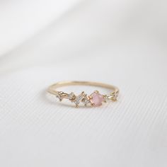 This eclectic ring has an array of crystals in different colours and shapes to form a unique, distinct design. Main material: Rose Gold, Rhodium, 16k Gold Plated on Brass, Cubic Zirconia * Tarnish-resistant protective coating Need some jewelry inspiration? Follow us on Instagram  @statementGrey Affordable Rose Gold Promise Jewelry, Daily Wear Rings Diamond, Promise Rings Danty, Dainty Pink Stackable Rings For Wedding, Pink Open Ring Midi Rings For Wedding, Delicate Crystal Gemstone Ring For Promise, Dainty Pink Crystal Ring For Wedding, Minimalist Pink Wedding Rings, Dainty Pink Cubic Zirconia Ring