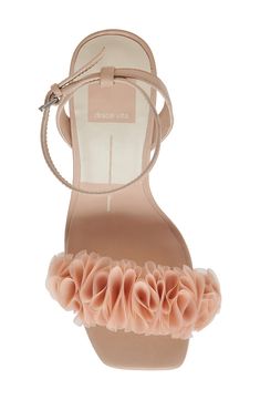 Voluminous ruffles add modern elegance to the vamp of a soirée-ready sandal framed by a squared-off toe and flared block heel. 3 1/4" heel (size 8.5) 3" strap height Adjustable ankle strap with buckle closure Leather and textile upper/synthetic lining and sole Imported Summer Sandals With Padded Heel For Wedding Guest, Chic Wedding Sandals For Summer, Chic Sandals For Wedding Guest In Summer, Chic Summer Sandals For Wedding Guest, Summer Wedding Guest Heels With Wrapped Heel, Glamorous Heels For Spring Wedding Guests, High Heel Sandals For Summer Wedding Guests, Summer Sandals With Heel Strap For Wedding Guests, Summer Open Heel Sandals For Wedding Guest