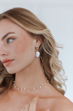 The Gemma Drop Earrings are a must-have jewelry staple. Style these beauties on your wedding day, honeymoon or next vacation for the ultimate cool girl look. Chic Pearl Earrings For Wedding, Feminine Dangle Jewelry With Matching Earrings, Chic Pearl Drop Linear Earrings For Wedding, Chic Pearl Drop Earrings For Wedding, Chic Linear Drop Earrings For Wedding, Chic Pearl Drop Bridal Earrings For Wedding, Chic Pearl Jewelry With Matching Earrings, Feminine Drop Earrings For Pierced Ears, Chic Wedding Linear Pearl Drop Earrings