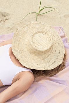 Woven hat on top of model's head that's laying down with a pink and purple fabric on the beach. Beach Mom, Womens Beach Hat, Woven Hat, Womens Visor, Beach Hats, Trendy Hat, Swimming Outfit, Bag Boys, Handmade Hat