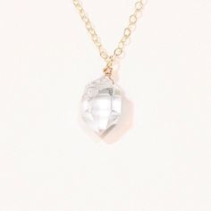 "This eye-catching Herkimer quartz stone is secured to a quality chain of your choice of Rose Gold Filled, Sterling Silver, or Gold Filled. The Herkimer quartz is of amazing quality and shines like a beauty making your neckline stand out. The clear quartz is a very versatile color and can go with any outfit you have so it's a sure win for your wardrobe. This amazing necklace is available in any length you would like ranging from 16\"-20\" The Stone is approximately 10-12mm in size. When searchin Herkimer Diamond Necklace, Diamond Quartz, Herkimer Diamond, Diamond Pendant Necklace, Quartz Necklace, Christmas Gifts For Her, Quartz Stone, Clear Quartz, Diamond Pendant