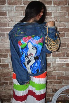 "Hand painted denim Jacket with painting Jacket with art work on it Art on Denim jean Jacket with pop-art Girl in wreath Flowers on the head This jacket is sold, I can draw for you any other drawing. Write me a personal message on Etsi, and we'll arrange everything. Choose the size of the jacket and design of the jacket, we can in personal correspondence to Etsy. The design consists on a hand painted illustration on the back. I used acrylic and textile paint, so don't worry, it won't come off wh Hand Painted Blue Denim Jacket For Spring, Spring Hand Painted Blue Denim Jacket, Artistic Blue Denim Jacket For Spring, Blue Denim Jacket With Custom Artwork For Spring, Artistic Hand Painted Blue Denim Jacket, Spring Hand Painted Denim Jacket, Hand-painted Blue Denim Jacket, Blue Hand Painted Denim Jacket, Art On Denim