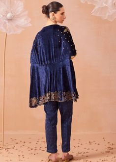 A hand embroidered kurta set embellished with sequins and dabka work paired with pants. Indigo Set With Chikankari Embroidery, Designer Indigo Sets With Chikankari Embroidery, Indigo Sets With Chikankari Embroidery, Blue Pant Set With Resham Embroidery, Festive Indigo Sets With Resham Embroidery, Festive Indigo Chanderi Sets, Indigo Wedding Sets With Dupatta, Indigo Wedding Set With Dupatta, Wedding Indigo Sets With Dupatta