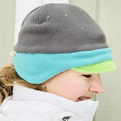 "OMG!!!! Never knew a hat that would fit perfect, is very comfortable, soft, and keeps my ear warm too...all in one, wow!" - Gail, TX Women's Fleece Beanie Hat A Trio of Colors Hat! This anti-pill fleece newsboy hat is designed with function, style and you in mind. Need more color in your life? Yes! Triple your fun in the new fleece hat color combo in a pre-selected trio of yummy fleece colors! Whether you're shoveling the driveway or tackling the big grocery day on a blustery winter day - do it Windproof Beanie One Size, Windproof Beanie Hat One Size, Warm Bonnet For Outdoor Use, Adjustable Warm Hats For Outdoor, Warm Adjustable Outdoor Hats, Winter Outdoor Hat With Ear Flaps, Winter Outdoor Hats With Ear Flaps, Windproof Hats With Ear Flaps For Cold Weather, Warm Bonnet With Ear Flaps For Cold Weather