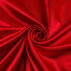 Red bridal satin fabric offers a beautiful smooth medium weight 100% polyester shiny satin material and popular for wedding dresses, gowns, apparel, fashion, and event decor. Bridal satin is an affordable option for table linens, draperies, chair covers, sashes, napkins, embroidered fabric, fashion, children's wear, crafts, and much more. Sold wholesale in a 70 yard roll. Color can vary by dye lot or batch. Catherine Medici, Satin Fabric Texture, Red Satin Fabric, Background Pics, For Wedding Dresses, Silk Satin Fabric, Beautiful Background, Drape Sleeves, Embroidered Fabric