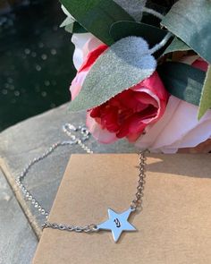 Beautiful stainless steel necklace with personalized star attached.  Perfect gift for a birthday or any special occasion. You can buy it individually as a set with bracelet. All personalization made to order. Wear it alone or in layers with other of our beautiful personalized necklace. Necklace can be adjust from 14 to 18 inches. Let us know the length you prefer in the personalization box. I hand stamp every piece, so there may be some mild variations (letters, numbers, or designs not perfectly Silver Star Necklace, Engraved Cuff, Star Necklace Silver, Retirement Gifts For Women, Stamped Bracelet, Chocker Necklace, Necklace Necklace, Bookish Gifts, Personalized Initials