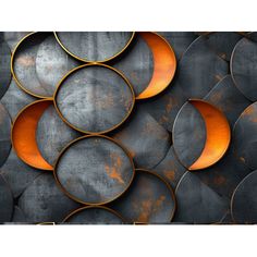 an abstract photograph of orange and black circles on grey background with rusted metal surface