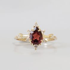 Yellow Gold Garnet Ring With Rose Cut Diamonds, Fine Jewelry Yellow Gold Garnet Ring, Yellow Gold Garnet Ring Fine Jewelry, Fine Jewelry Burgundy Garnet Ring, Burgundy Garnet Rings Fine Jewelry, Yellow Gold Garnet Promise Ring, Gold Garnet Cluster Promise Ring, Gold Rings With Rose Cut Diamonds And Garnet, Gold Garnet Ring With Rose Cut Diamonds