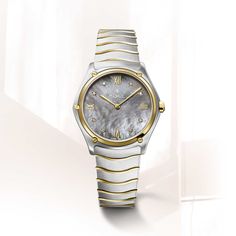 women's ebel sport classic watch, stainless steel and 18k yellow gold case, ø 33mm, grey mother-of-pearl dial with applied roman numerals and 8 diamonds (0.052ct), sapphire crystal with antireflective treatment underneath, two-tone stainless steel wave link bracelet with a folding clasp, swiss quartz movement, water-resistant up to 5 bar Classic Watches, Gold Case, Roman Numerals, Watch Collection, Sapphire Crystal, Quartz Movement, Link Bracelets, Chronograph, Mother Of Pearl