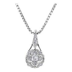 This is part of Chairish’s Fine Jewelry assortment.  Introducing the exquisite Art Deco Floral Diamond Pendant Necklace—a true embodiment of timeless elegance and sophistication. Crafted with meticulous attention to detail, this captivating piece showcases a dazzling 0.55 carat diamond set in a lustrous 18-karat white gold setting. The pendant's design draws inspiration from the Art Deco era, characterized by its geometric patterns and intricate motifs. The centerpiece of this necklace features Refined Silver Necklace With Single Cut Diamonds, Classic Formal Diamond Necklace, Exquisite Diamond Necklace With Intricate Design, Elegant Oval Bridal Necklace For Formal Occasions, Exquisite White Gold Hand-set Necklaces, Exquisite White Gold Hand Set Necklace, Fine Jewelry Diamond Necklace With Intricate Design, Elegant Jewelry With Single Cut Diamonds In Flower Pendant, Elegant Wedding Diamond Necklace With Flower Pendant