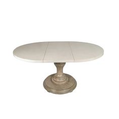 a white table with an oval top on a metal base, against a white background