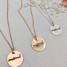 A minimalist lover's modern token of motherhood. A beautiful piece to celebrate your mama status. Mamã with the accent on the a is an ode to the designers Portuguese heritage. We love this piece to layer with other necklaces. Pendant measures 5/8 inch. Available in sterling silver, 14kt gold or rose gold fill made to last and be worn everyday. Fancy Font. This piece is ready to ship and usually leaves our studio in 1 to 3 business days. BACK TO MY SHOP: https://www.etsy.com/shop/IsabelleGraceJew Nickel-free Name Necklace For Mother's Day Gift, Nickel-free Necklace For Mother's Day Personalized Gift, Hand Stamped Name Necklace For Mother's Day, Personalized Rose Gold Necklaces For Mother's Day, Personalized Rose Gold Necklace For Mother's Day, Everyday Mother's Day Charm Necklace With Round Disc, Everyday Round Disc Charm Necklace For Mother's Day, Mother's Day Pendant Charm Necklace, Nickel Free Necklaces For Mother's Day