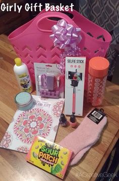 the girly gift basket is filled with crafting supplies