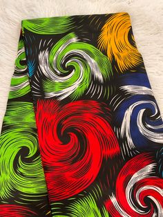 This Multicolor African Fabric is high quality African print made from 100% cotton and it's 45 inches wide. It is used for making African Clothing, African quilts, & For Home decoration. FYI: Print is Double sided. The listing is for 1, 6 yards and Headwrap Each piece of fabric measures:  36in by 45in for 1 yard 216in by 45in for 6 yards 70in by 22in for Head wrap If you purchase more than one yard, you will receive one continuous piece. *If you require more than what I have listed, feel free to Printed Yellow Ankara Fabric, Yellow Printed Ankara Fabric, Cotton Fabric With Vibrant Multicolor Print, Multicolor Cotton Fabric With Vibrant Print, Vibrant Multicolor Cotton Fabric, Colorful Ankara Fabric With Multicolor Pattern, Multicolor Ankara Fabric With Colorful Pattern, Traditional Yellow Fabric With Colorful Pattern, Colorful Cotton Digital Prints