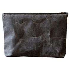 "The Large Utility Pouch in Gray A durable and water resistant waxed canvas pouch. It's perfect for keeping all your daily essentials organized. It makes a great clutch, pencil case, or makeup bag. Use it alone for quick runs or toss in a tote bag and go. The simple design and earthy color will go with any style. Waxed canvas produces unique creases and markings - making yours essentially one of a kind. Details: - material: waxed cotton canvas, 100% cotton - size: 12\" wide x 7.5\" tall x 1.5\" gusset - black brass metal zipper - unlined - made in the USA - processed within 1-3 business days - minimally packaged - last few photos for reference only - available in other colors www.etsy.com/shop/jennengStudio?section_id=21330427  Get 20% OFF your first purchase!  Copy & paste this link to si Canvas Travel Pouch With Zipper, Canvas Pouch For Everyday Use, Practical Everyday Pouch With Zipper Pocket, Everyday Canvas Cosmetic Bag With Zipper, Practical Zipper Pouch Cosmetic Bag For Daily Use, Practical Everyday Pouch With Zipper Closure, Everyday Canvas Pouch With Zipper Closure, Practical Cosmetic Bag With Zipper For Everyday Use, Minimalist Zipper Pouch For Everyday Use