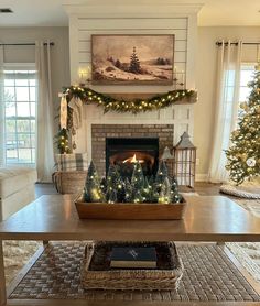 a living room filled with furniture and a fire place covered in christmas decorations on top of a coffee table