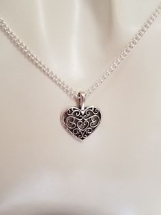 "New Handmade Scroll Heart Pendant Necklace ♡ Silver plated chain measures 18 inches ♡ Scroll heart pendant measures 1/2\" × 3/4\" ♡ Lobster clasp closure Ships from the U.S. within 24 hours of cleared payment" Heart Charm Necklace With Round Pendant, Metal Heart Necklace With Open Heart Charm, Heart Charm Metal Necklace, Metal Heart Pendant Necklace, Metal Heart Pendant Necklace For Valentine's Day, Nickel-free Heart Necklace For Anniversary, Metal Heart Pendant Charm Necklace, Metal Charm Necklaces With Open Heart Design, Metal Charm Necklace With Open Heart