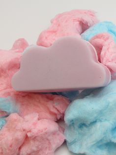 Our Cotton Candy Dreams soap bars are sure to leave you feeling like a carnival treat 🎡 With the delicious cotton candy scent, the soap glides on your body with ease. Our high quality ingredients nourish the skin and help improve its look and durability 🧼 Each soap also contains an ombre of pink and purple to give it a true cotton candy vibe 🍭  Our cotton candy cloud soaps are smaller than our average size measuring at  Length: 2.5-Width: 1.5-Height: 1.1- Weight: 2oz. The ice cream shape soaps come in a pack of 3 and measure at various sizes. Each small ice cream weighs about 1oz. The 3 pack will come as shown in the photos. Cotton Candy Scent, Cotton Candy Clouds, Pink Cloud, Scented Oils, Soap Bars, Pink Clouds