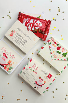 candy bar and envelopes with santa claus on them