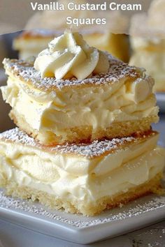 vanilla custard cream squares stacked on top of each other