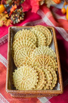 some cookies are in a basket on a table