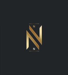 the letter n is made up of gold foil and has a diagonal stripe on it