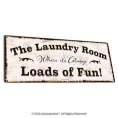 a sign that reads the laundry room where it's always loads of fun