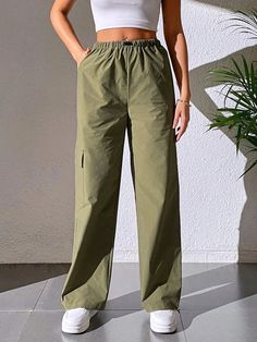 Stay effortlessly stylish with our Casual Plain Cargo Cropped Pant. These pants feature a cropped length and a clean, plain design, offering a versatile and contemporary style. With a relaxed fit and comfortable fabric, they are perfect for casual and everyday wear. These cargo cropped pants are a must-have addition to your wardrobe for a trendy and laid-back look.Specification: Style: Casual Pattern Type: Plain Type: Cargo Pants Closure Type: Elastic Waist Details: Pocket Waist Line: Natural Le Plain Design, Cropped Pants, Cargo Pants, Contemporary Style, Must Haves, Elastic Waist, Everyday Wear, Relaxed Fit, Elastic