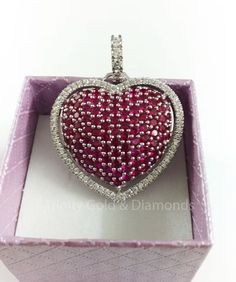 Pave Ruby And Diamond Heart Pendant Necklace, Ruby Heart Pendant, Gemstone Heart Pendant, Birthstone Heart Pendant, Big ruby Heart Pendant Main stone : Ruby Gemstone Creation : Lab Created Diamonds *Secondary Stones: Moissanite Diamond (MOISSANITE PASSES DIAMOND Tester Metal Purity: 925 parts per 1000 Cut: Very Good Metal: Sterling Silver ** PRODUCT CARE ** >> Keep your jewels safe in our box. >> When storing jewelry make sure it doesn't rub against other jewelry >> Though our jewelry doesn't turn black it is recommended to keep it away from water chemicals, soap, etc. ** SHIPPING ** We ship all time via standard post, It takes around3-5 working days to deliver an item. M O R E ∙ F R O M ∙ U S https://www.etsy.com/in-en/shop/trinitygolddiamonds?ref=seller-platform-mcnav Customization is al Heart-shaped Cubic Zirconia Jewelry For Valentine's Day, Cubic Zirconia Heart Necklace With Gemstone For Valentine's Day, Heart Necklace With Cubic Zirconia For Valentine's Day, Valentine's Day Heart Necklace With Cubic Zirconia Gemstone, Cubic Zirconia Heart Necklace With Gemstone, Heart-shaped Gemstone Heart Necklace For Weddings, Heart-shaped Gemstone Necklace For Wedding, Diamond Heart Necklace With Gemstone, Heart-shaped Diamond Necklace With Gemstone