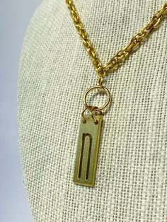 Vintage type set initial letter to personalize your everyday. Each brass letter is unique in its own way and sealed with a clear coat finish to prolong the oxidation process. This 'n' is paired with a vintage upcycled chain. Vintage Brass Medallion Necklace With Adjustable Chain, Vintage Brass Charm Necklace With Coin Pendant, Vintage Brass Necklace With Coin Pendant, Vintage Brass Choker Necklace, Vintage Coin-shaped Brass Necklaces, Vintage Brass Coin Necklaces, Vintage Necklaces With Adjustable Chain For Everyday, Vintage Necklace With Adjustable Chain For Everyday, Vintage Coin Necklace With Adjustable Chain