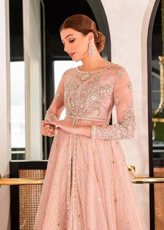 Pakistani Pink Dress in Royal Pishwas Fock and Lehenga Style is an epitome of Elegance and Royalty adorned with hand-crafted Embellishments. Fast shipping. Anarkali Style Embellished Wedding Dress For Eid, Elegant Semi-stitched Wedding Dress For Festive Occasion, Elegant Wedding Dress For Eid With Traditional Drape, Elegant Wedding Dress With Traditional Drape For Eid, Festive Anarkali Embellished Wedding Dress, Festive Embellished Anarkali Wedding Dress, Eid Reception Dress With Zari Work, Elegant Formal Gown With Dabka Work, Elegant Semi-stitched Wedding Dress With Zari Work