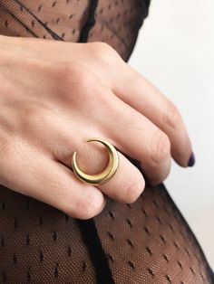 This ring is a piece from Keras collection.Sculptured and casted in solid sterling silver 925 and then double gold plated with 22k gold.Very nice and important weight. The crescent is 20mm (0.787 inch) All of my jewelry is handmade please allow for small variances from piece to piece ,as this is a feature of owning one of a kind original handmade jewelry. Feel free to ask me for personal orders . -22k gold platted Sterling silver 925 You may also like on bright silver https://www.etsy.com/listin Celestial Gold Crescent Rings, Mystical Crescent Rings With Moon Charm, Celestial Crescent Gold Rings, Mystical Crescent Moon Charm Rings, Gold Celestial Moon Ring, Elegant Crescent Moon Charm Rings, Minimalist Crescent Moon Charm Ring, Gold Sterling Silver Ring With Moon Charm, Gold Moon Charm Promise Ring