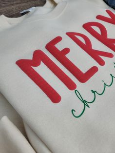 Step into the holidays with this adorable Merry Christmas Puff Graphic Sweatshirt. 🎄These are custom made to order. Please allow up to 10 business days to make and ship your item. 🎄 YOU MUST WASH THIS GARMENT INSIDE OUT WITH COLD WATER ON DELICATE ONLY HANG DRY ONLY If you do not follow the proper care instructions the letters WILL fall off. We are not responsible for damaged items not following the proper care instructions. Diy Christmas Sweater Cricut, Puff Letter Sweatshirt, Merry Christmas Sweatshirts, Christmas Sweater Cricut, Cricut Sweatshirt Ideas, Christmas Sweatshirt Ideas, Puff Vinyl, Diy Christmas Sweater, Letter Sweatshirt