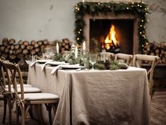 the table is set with candles and place settings