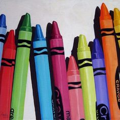 several crayons are lined up in a row