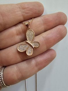 Beautiful dainty butterfly pendant gliding on a dainty 14K rose gold filled chain. This lovely animal jewelry is set with tiny sparkly brilliant clear zircon stones . Classic elegant occasion necklace that makes the perfect gift for her This lovely necklace makes a beautiful birthday or anniversary gift for her. ♥ DETAILS Necklace: 14K Rose Gold Filled Pendant Length: 1.78" X 0.67" inch (=20mm X 17mm) Pendant: Butterfly made of 2 microns thick rose gold cover plating set with tiny clear zircon stones Necklace Length: 16" + Extender ♥ Personalized it! Add an initial letter to the necklace clasp - https://www.etsy.com/listing/612297583 ♥ GIFT IT! Jewelry comes in a cute little box ready for gifting! I can ship to a third party if you wish your item to be a gift. Please let me know and I will Sparkly Butterfly, Pendant Butterfly, Gold Butterfly Necklace, Dainty Butterfly, Rose Gold Butterfly, Butterfly Necklace Gold, Necklace Clasp, Stones Necklace, Detailed Necklace