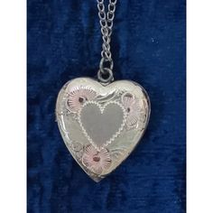 Vintage Sterling Silver 18" chain & about 1" heart locket. Front of heart has decorative etching with slight pink and yellow tones. Silver is tarnished on heart and chain. Comes in original box which shows some wear. Appears to not have been worn. Vintage Double Heart Engraved Necklace, Vintage Engraved Double Heart Necklace, Vintage Personalized Heart Pendant Necklace, Personalized Vintage Heart Necklace, Vintage Double Heart Engraved Locket Necklace, Vintage Heart Keepsake Necklace, Vintage Heart Locket Necklace Nickel Free, Vintage Double Heart Locket Necklace, Vintage Nickel-free Heart Necklace For Anniversary