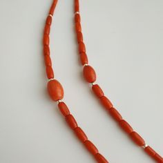 < Orange coral beaded necklace > This product made according to the model of authentic traditional Ukrainian jewelry. The coral is modern, the design is vintage. Like 99% of the coral on the market these days, this coral has been dyed. I use bamboo coral which is not endangered or threatened in any way, unlike natural pink or red coral (the production of which is forbidden almost everywhere in the world). Bamboo coral doesn't mean it's not organic. Every bead of it has a distinctive and be Traditional Coral Beaded Necklaces With Polished Beads, Traditional Coral Necklace With Polished Beads, Artisan Red Coral Beaded Necklace With Polished Beads, Bohemian Red Coral And Wooden Beads, Traditional Handmade Red Coral Beads, Traditional Coral Necklace With Gemstone Beads, Traditional Coral Beaded Necklaces, Orange Red Coral Beaded Necklaces Hand-strung, Traditional Coral Gemstone Beads