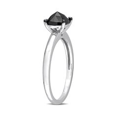 a black diamond engagement ring on a white background with the center stone in the middle