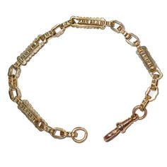 9ct Yellow gold fancy link 'watch chain' bracelet. This chain was part of an antique watch chain, circa 1900. Clasp added in recent years.  Weight   13.5 grams Length of chain 21.5 cm Each and every piece listed by Vintage Fine Jewellery has been restored by hand in our London workshop by highly skilled jewellers. Our jewellers use the same expertise to restore a piece of jewellery, as used in their creation many years ago. If you would like to see more of the Vintage Fine Jewellery Collection, Antique Yellow Gold Link Bracelet, Vintage Yellow Gold Chain Bracelet With Rectangular Links, Vintage Yellow Gold Chain Link Bracelet, Vintage Yellow Gold Chain Bracelet, Vintage Gold Bracelet With Rectangular Links, Vintage Yellow Gold Link Bracelets, Vintage Yellow Gold Oval Link Chain Bracelet, Vintage Yellow Gold Bracelet With Rectangular Links, Vintage Yellow Gold Link Bracelet