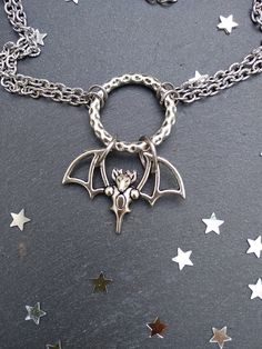 PLEASE read my shop announcement before placing an order so you know what to expect right now. Plus, when ordering from outside Europe, don't forget to provide a phone number for the courier to ensure the fastest and smoothest delivery. Witchy bat choker O ring necklace. Perfect for Samhain / Halloween, or your witchy everyday Short necklace, total length is 13 inches, about 43 cm. It fastens with a strong lobster clasp, and has a 2 inches, 5cm., extension chain. I can make this in your desired Vampire Style Halloween Choker Jewelry, Silver Vampire Choker For Halloween, Gothic Sterling Silver Choker Necklace, Silver Fantasy Necklace For Halloween, Vampire Style Choker Necklace For Halloween, Halloween Vampire Choker Necklace, Halloween Gothic Pendant Jewelry, Vampire Style Halloween Choker Necklace, Gothic Nickel-free Choker Jewelry