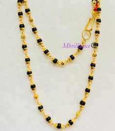 Mangalsutra chain necklace, 916 Yellow Gold GOLD PURITY : 916 gold purity Weight: 10.20 grams Size : 19 inches Length Colour : YELLOW GOLD Hallmark: Hallmarked 916 stamp Hook: '' fish hook clasp Design : Mangalsutra necklace with black beads. Authentic 916 Gold by Mbrilliance FAQs Q: Is it real gold? A: yes it's real authentic genuine 916 gold Q: can pawn? A: yes it's pawnable ⭐️GoForGold⭐️ Gold Chain With Black Beads, Gold Necklaces With Black Beads For Festivals, Traditional Yellow Gold Jewelry With Black Beads, Black Round Beaded Necklaces For Puja, Traditional Gold Necklace With Black Beads, Black 22k Gold Jewelry With Round Beads, Gold Black Beads Chain Indian, Chain With Black Beads, Black Round Beads Necklaces For Puja