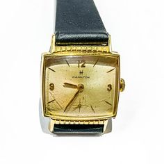 Vintage Art Deco Hamilton Mechanical WatchCase is 10k gold plated with a stainless steel back, and in good condition. Dial is gold/cream in color. Watch runs and keeps good time. Aftermarket new leather band.Please message us for more information.Marvin Scott & CoYardley-Buckingham-New Hopemarvinscottco.com1-800-861-3580 Antique Gold Watch For Business, Collectible Gold Watch With Rectangular Dial, Vintage Gold Watch Bands For Business, Vintage Gold Watch Bands For Formal Occasions, Gold Watches With Diamond Hour Markers For Collectors, Channel Set Rings, Mens Hats Fashion, Wave Necklace, Gold Cream