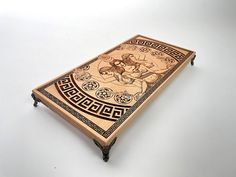 a wooden table with an intricate design on it