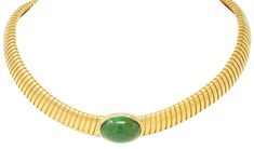 Designed as a tubogas necklace centering an oval-shaped tourmaline cabochon  Weighing approximately 17.29 carats - transparent light to medium green  Set east to west in high polished bezel  Completed by hidden clasp closure  Stamped for 18 karat gold Fully signed for Cartier, numbered and with maker's mark for Carlo Weingrill Circa: 1980s Width at widest: 5/8 inch Length: 14 3/4 inches with additional flex Total weight: 56.8 grams Stock Number: We-11673 Luxury Gold Tsavorite Necklaces, Wedding Jewellery Necklace, Green Tourmaline, Wedding Necklace, Estate Jewelry, Jewelry Care, Cartier, Beautiful Rings, Antique Jewelry