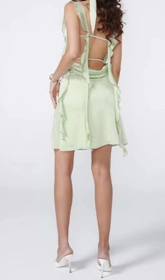 Elevate your allure with our Sage Green Satin Mini Dress. Crafted to captivate, its satin fabric drapes luxuriously, while the subtle hue exudes sophistication. Perfect for any occasion, it radiates timeless elegance with a modern twist. Mini Prom Dresses, Evening Dresses Cocktail, Junior Bridesmaid Dresses, Satin Mini Dress, Junior Bridesmaid, Green Satin, Draped Fabric, Junior Dresses, Bandage Dress