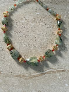 Prehnite Necklace. Prehnite faceted nugget stones accented with Bali style gold plated copper beads, fire opal crystals and 8MM faceted round Prehnite stones.  Gold filled toggle clasp. Necklace measures 18 inches. handmade GIFT BOXED Prehnite Necklace, Toggle Clasp Necklace, Bali Style, Bali Fashion, Clasp Necklace, Necklace Green, Necklace Gemstone, Amethyst Necklace, Chunky Necklace