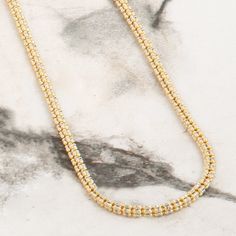 EXPERIENCE THE FIRE of the 4mm 14k Ice Chain. This meticulously crafted piece features an intricate two-tone structure, creating the illusion of a dazzling diamond-paved chain. The Ice Chain's striking design pairs perfectly with a diamond pendant, adding an energetic and masculine touch to your look. Whether worn solo or with your favorite pendant, this chain's dynamic style and radiant shine make a powerful statement, elevating your style to new heights. MATERIALS & SPECS This 4mm gold chain b Ice Chain, Gold Chains For Men, Mens Gold, The Ice, The Fire, Diamond Pendant, Gold Chain, Gold Chains, Two Tone